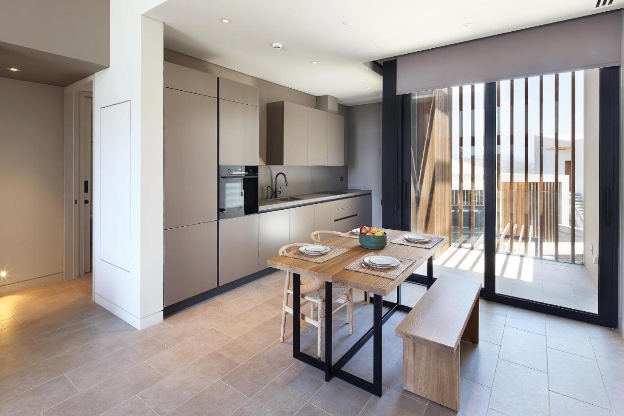 Minthis Resort Tsadha Exterior photo The kitchen and dining area of a typical apartment