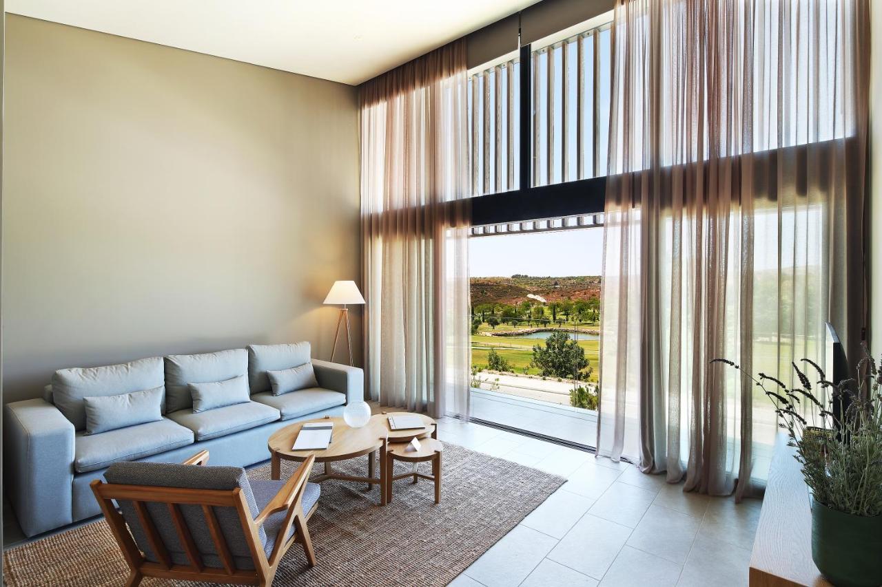 Minthis Resort Tsadha Exterior photo Interior of a villa at the resort
