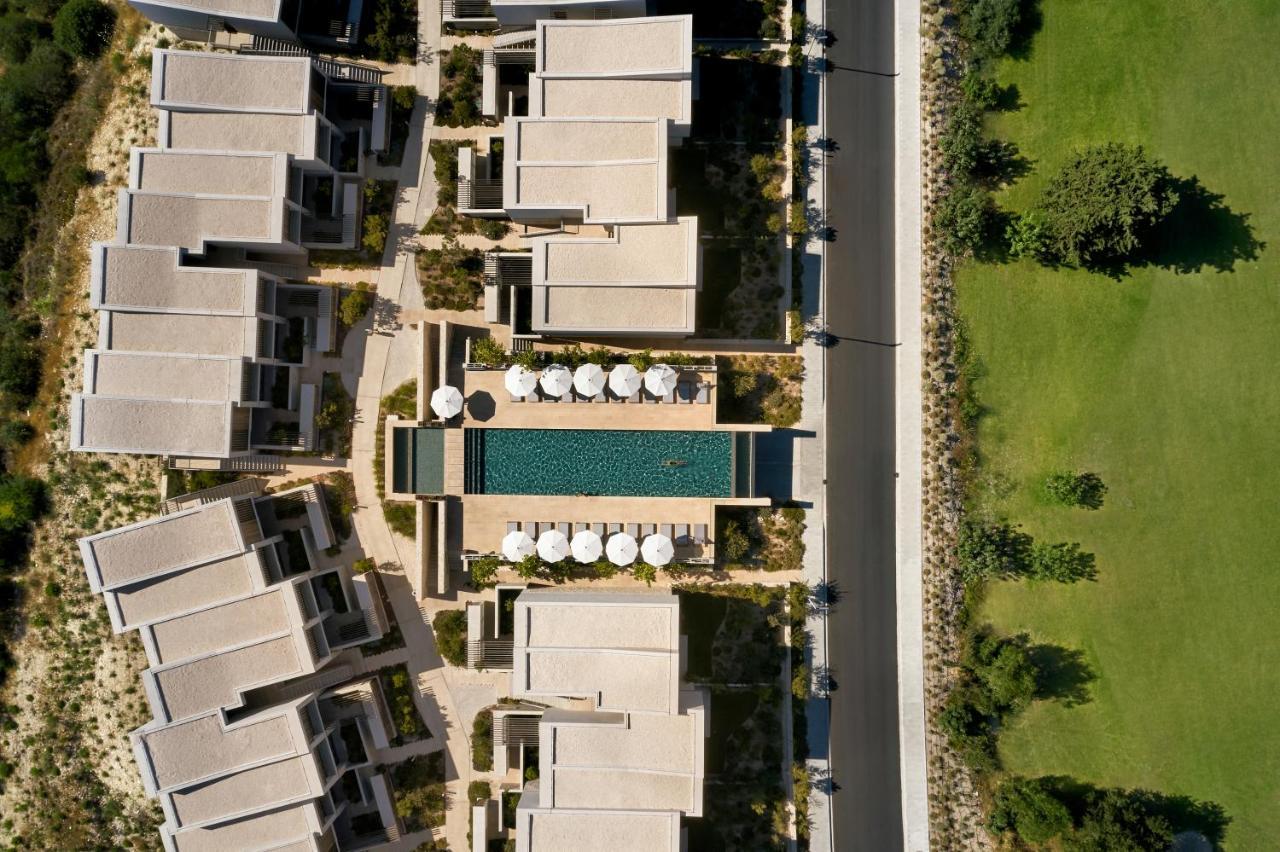 Minthis Resort Tsadha Exterior photo Aerial view of the hotel