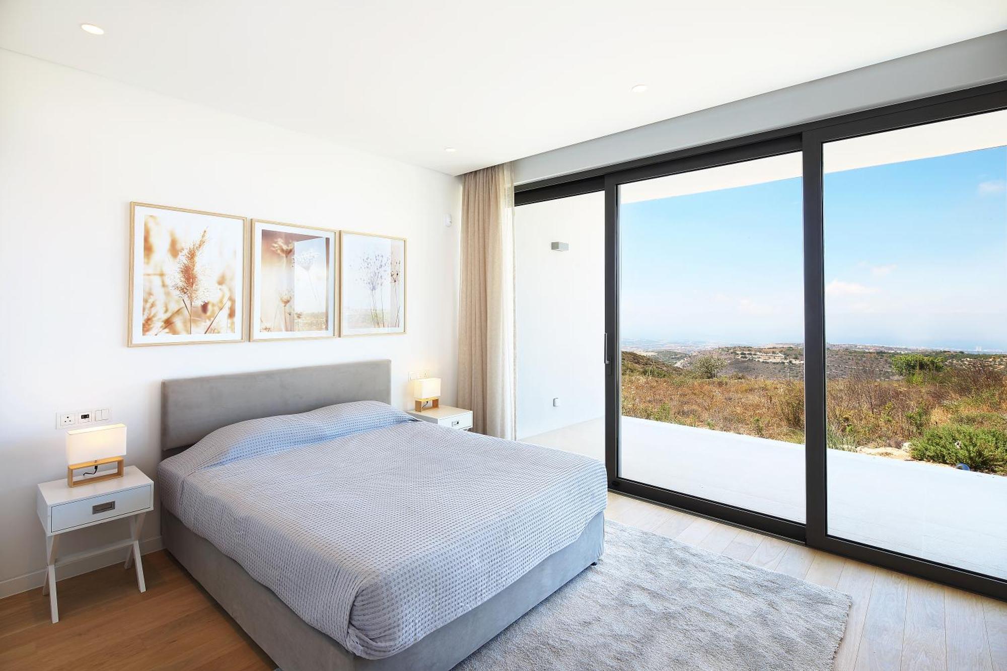 Minthis Resort Tsadha Exterior photo Bedroom with sliding doors