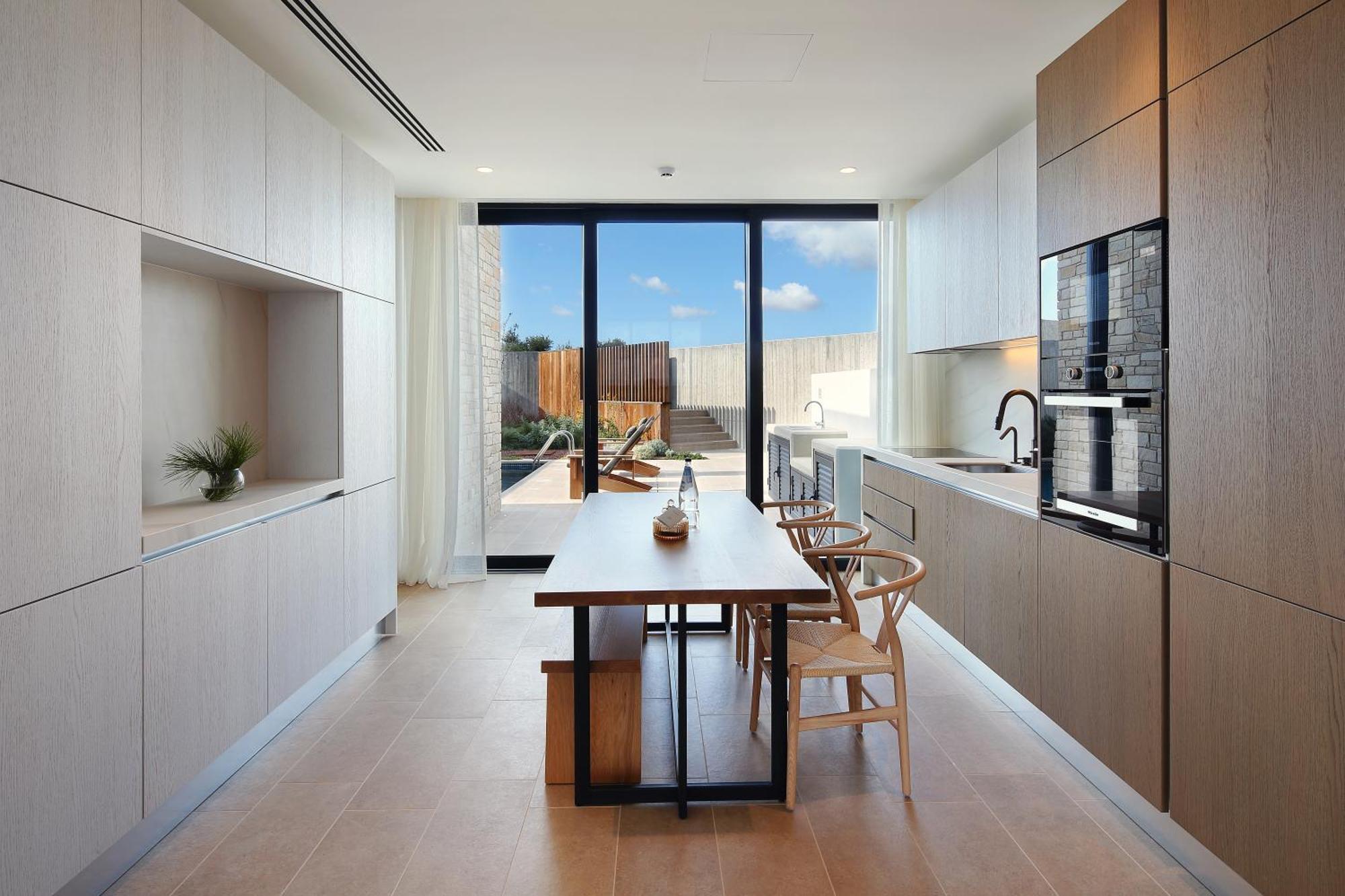 Minthis Resort Tsadha Exterior photo A kitchen in a typical apartment
